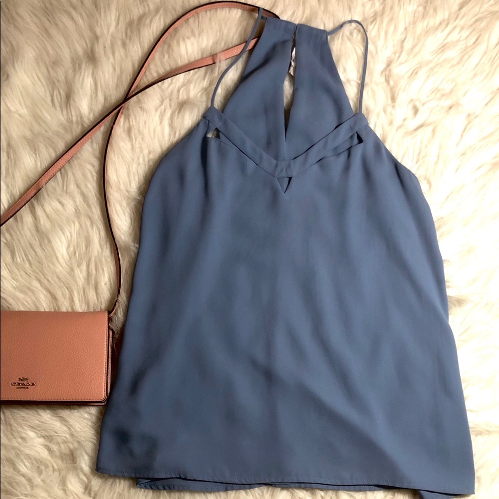 A cute 👚 which I have only worn twice. 😚